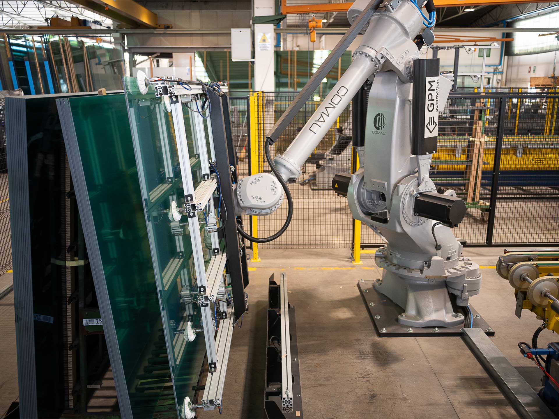 braccio robotizzato lavorazione Molatura Vetro